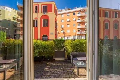 a view of a building from a window at kathy Home Rome Suite in Rome