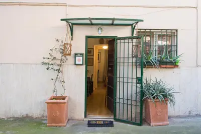 a kitchen with a table and a dining room at Apartment in the center of Rome in Rome