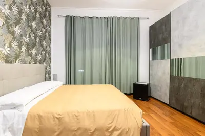 a bedroom with a large bed and a window at B&B La Terrazza sui Colli in Rome
