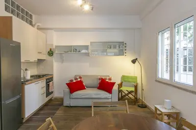 a living room with a couch and a table at Arbia Stay in Rome
