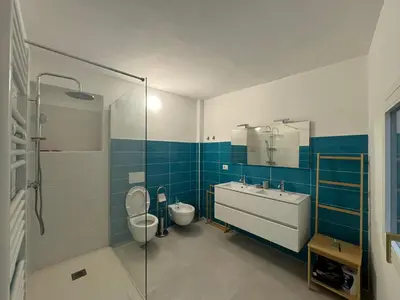 a bathroom with a toilet and a sink and a shower at Le Due Torri in Rione Monti in Rome