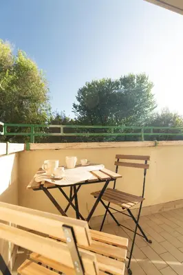a table and chairs sitting on a roof at Casa Sole in Rome