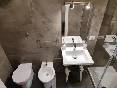 a bathroom with a toilet and a sink at A&B Vatican Domus in Rome