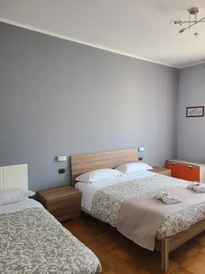 a bathroom with a sink and a shower and a toilet at VIVA Rome Apartment 