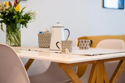 a red and white coffee maker sitting on a counter at Casa Geco Cozy apartment near St Peter in Rome