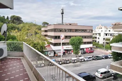a balcony of a building with a parking lot at Domus St Peter in Rome
