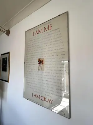 a mirror hanging on a wall in a room at Trastevere Penthouse in Rome