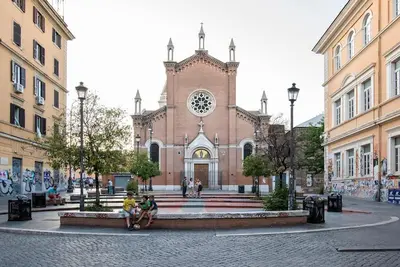 a church with people sitting in front of it at Urban Oasis near Termini with Patio, int1b in Rome
