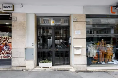 a store front with a large glass door at Veroli Vacanze Romane in Rome