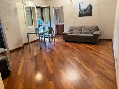 a bathroom with a toilet and a sink at Aurelia Antica Apartaments in Rome