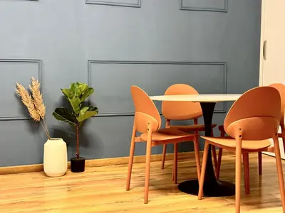 a table and chairs in a room at Boutique Trevi Apartment in Rome