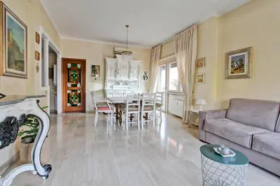 a living room with a couch and a table at Elle House in Rome