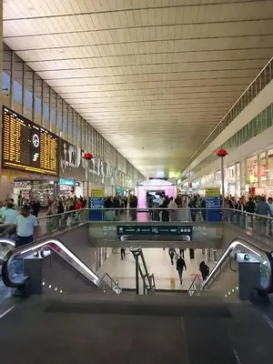 a large crowd of people in a shopping mall at Moon and Sun LT Apartament in Rome