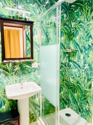 a bathroom with a sink and a mirror at Milazzo Suites in Rome