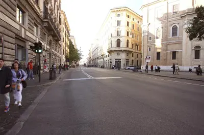 a group of people walking down a city street at Lovely studio in Campo de Fiori in Rome