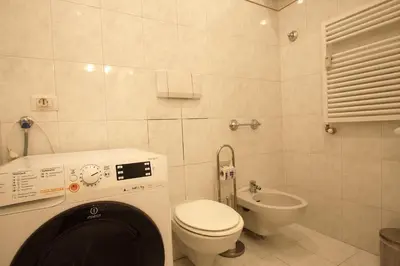 a small bathroom with a toilet and a sink at Lovely studio in Campo de Fiori in Rome