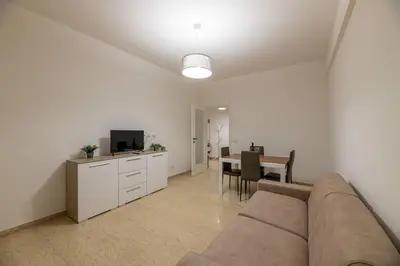 a living room with a couch and a table at Inside Rome in Rome