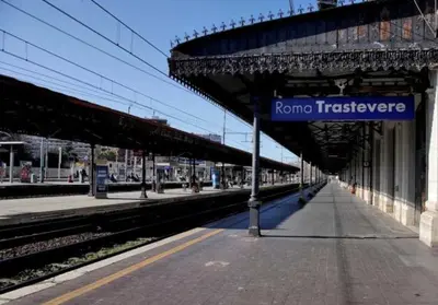 a train station with a sign that reads roma fireplace at Triple room a few steps from Tiber in Rome