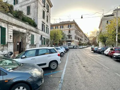 a bunch of cars parked in a parking lot at Giuli-Etta a Testaccio in Rome