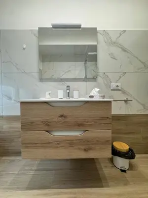 a bathroom with a sink and a mirror at Dimora Appia in Rome