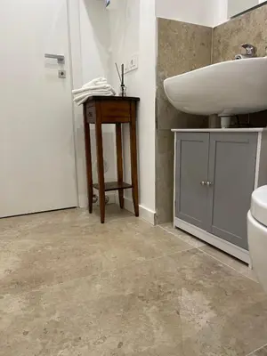 a bathroom with a sink and a toilet at Casa Sara in Rome