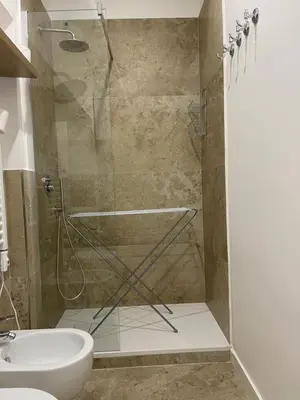 a bathroom with a shower and a sink at Casa Sara in Rome