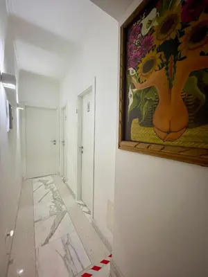 a bathroom with a sink and a mirror at Domus Massimiliani Guesthouse in Rome