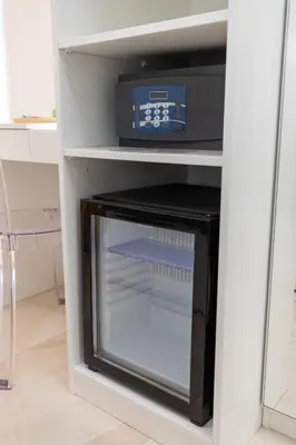 a refrigerator with its door open in a kitchen at Perfect! Vatican Location in Rome