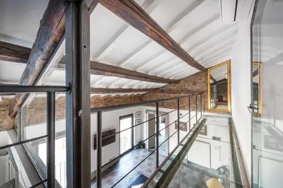an image of a glass staircase in a house at Torretta Luxury Attico in Rome