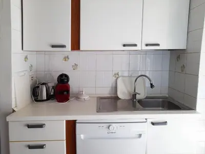 a kitchen with a sink and a counter top at Conca d'Oro 212 in Rome