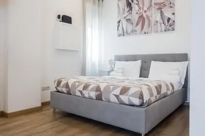 a bedroom with a bed in a room at Arya Roma San Pietro in Rome