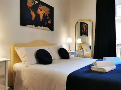 a bedroom with a bed with two pillows on it at Key apartments Vatican Flat in Rome