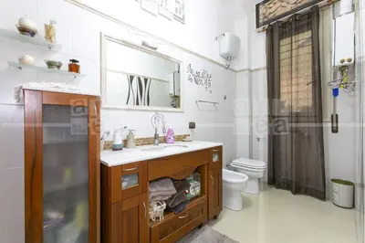 a bathroom with a sink and a toilet at Trastevere in Station in Rome