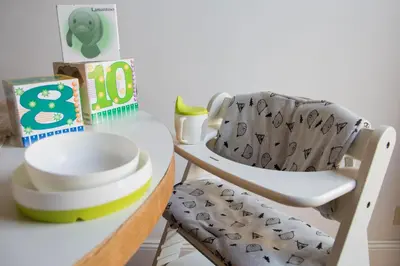 a chair sitting next to a table with a bowl at Appartamento Sofia in Rome