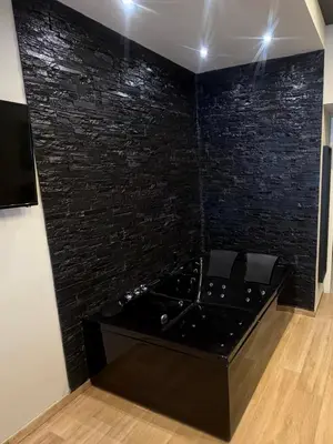 a bathroom with a shower and a sink at Eterna Suites Roma in Rome
