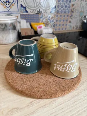 two coffee mugs sitting on top of a table at Angolo dè Trastevere - Accogliente e silenzioso in Rome
