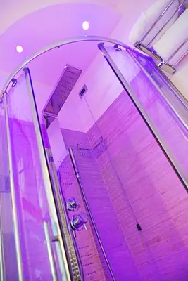 an escalator in a building with a purple at Affittacamere RFI in Rome