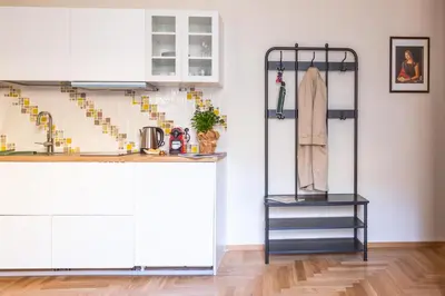 a kitchen with a counter and a shelf at Porta Pia apartment ZENO 53 in Rome