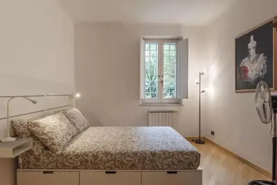 a bedroom with a bed and a window at HC - Live Roma Pantheon View in Rome