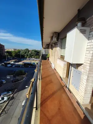 a balcony of a building with a view of a street at Al Trilocale Romano Metro A in Rome