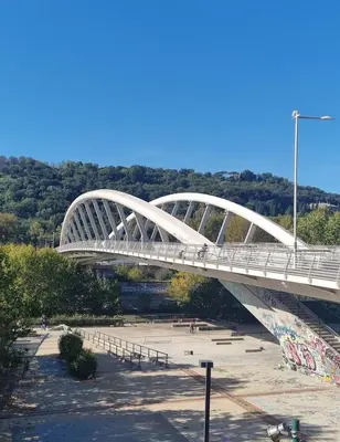 a white bridge over a body of water at Suite Guido Reni in Rome