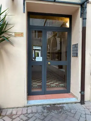 a blue door on a building with at Il diamante del Colosseo in Rome