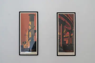 a pair of framed paintings on a wall at Rossovino a Roma in Rome