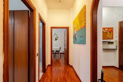a hallway with a hallway leading to a room at Vespa s house 10 minuti Musei Vaticani in Rome