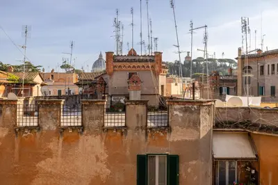 a view of an old city with buildings at Attico vista San Pietro, vicino ai Musei Vaticani in Rome