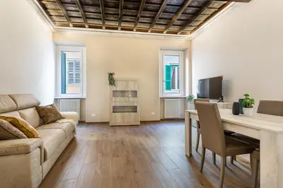a living room with a couch and a table at iFlat Augustus Suite near Pantheon in Rome