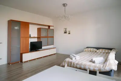 a bedroom with a bed and a television in it at La Dolce Vita rooms in Rome