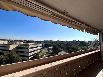 a balcony with a view of a city at Premium Apartment Papillo in Rome