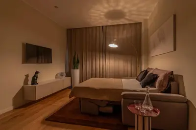 a hair dryer sitting on top of a pink surface at Villa Borghese Apartment in Rome