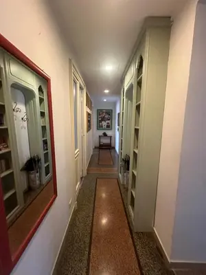a hallway of a house with a long hallway at Nel cuore di Roma in Rome